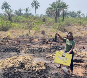 Grace at an oil degraded site at Rumuekpe community, Rivers State, Nigeria.