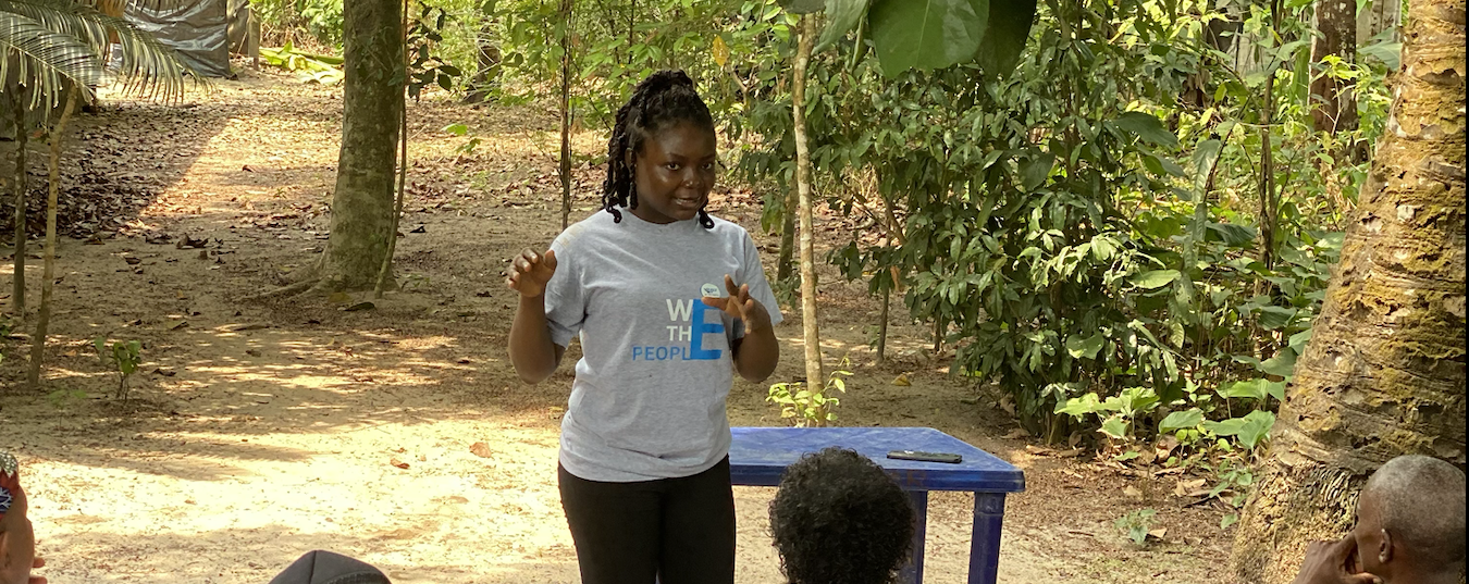 Grace speaking to indigenous people during the Global week of 