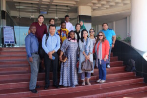Group photo in Cox's Bazaar before the start of a busy day, with Sharif, Samaa, Wigayi, Rezaul, Myo Su, Yasmine, Nazih, Jovin, Zaw, Fatima, Thi Thi, Nisreen and Sawsan.