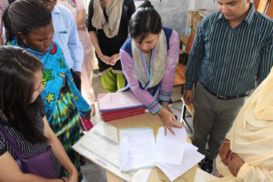 BNWLA staff and local paralegals going through their case management processes with participants.