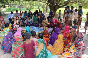 Discussion with local women's group about their gender-based violence committee in a BNWLA model village project.