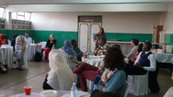 Learning exchange participant Liesl Muller of Lawyers for Human Rights in South Africa making a presentation on Advocacy duriing an advocacy meeting with CONCISE in Kibra Nairobi