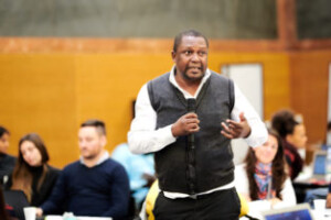 Chimwemwe Ndalahoma of PASI in Malawi speaks to the group.