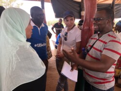 Learning exchange participants and Haki Center paralegals during the Mobile birth registration in Malindi