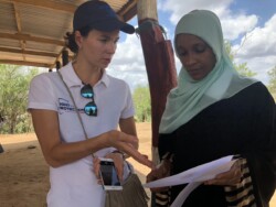 Iryna (Kenya learning exchange participant Iryna Aleiksiva from Ukraine) and Khadija (Paralegal with Haki Center) during the Mobile birth registration in Malindi