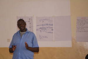 Abdi, community land mobilizer, explaining the community negotiation process.